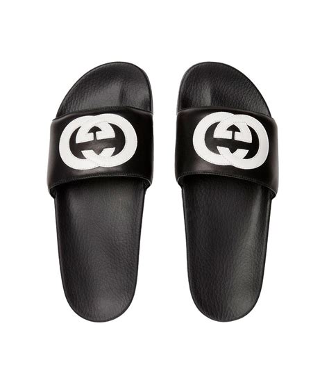 ciabatte gucci uomo nere|Ciabatte da mare e slides da uomo di Gucci .